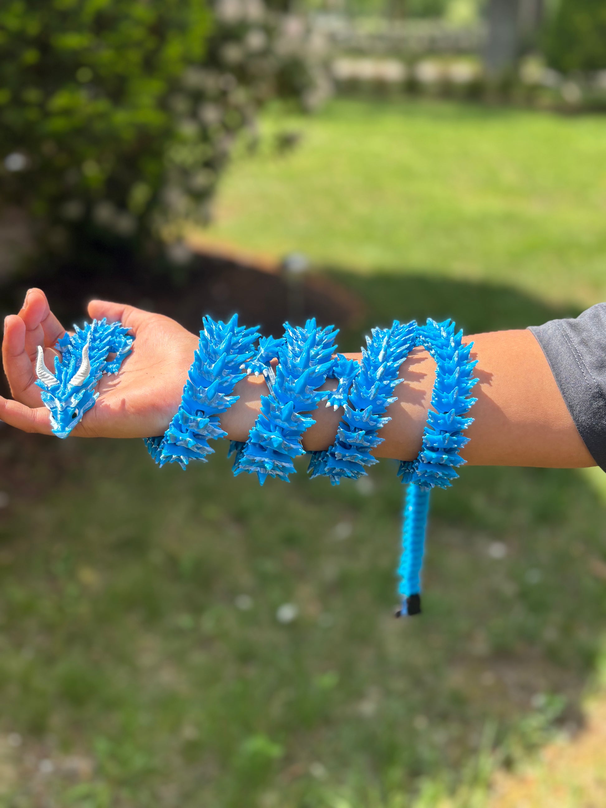 3D Printed Crystal Articulated Dragon 50 inches side view